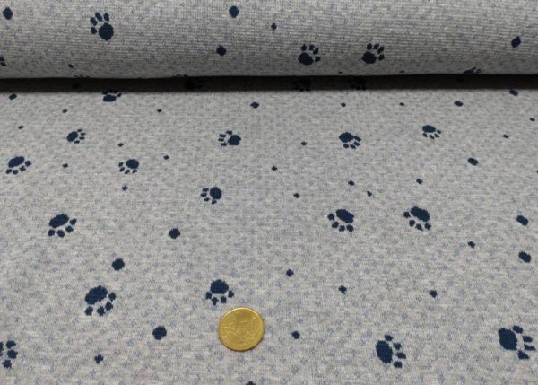 Knitted fabric Milo grey blue with paws paw fabric cotton